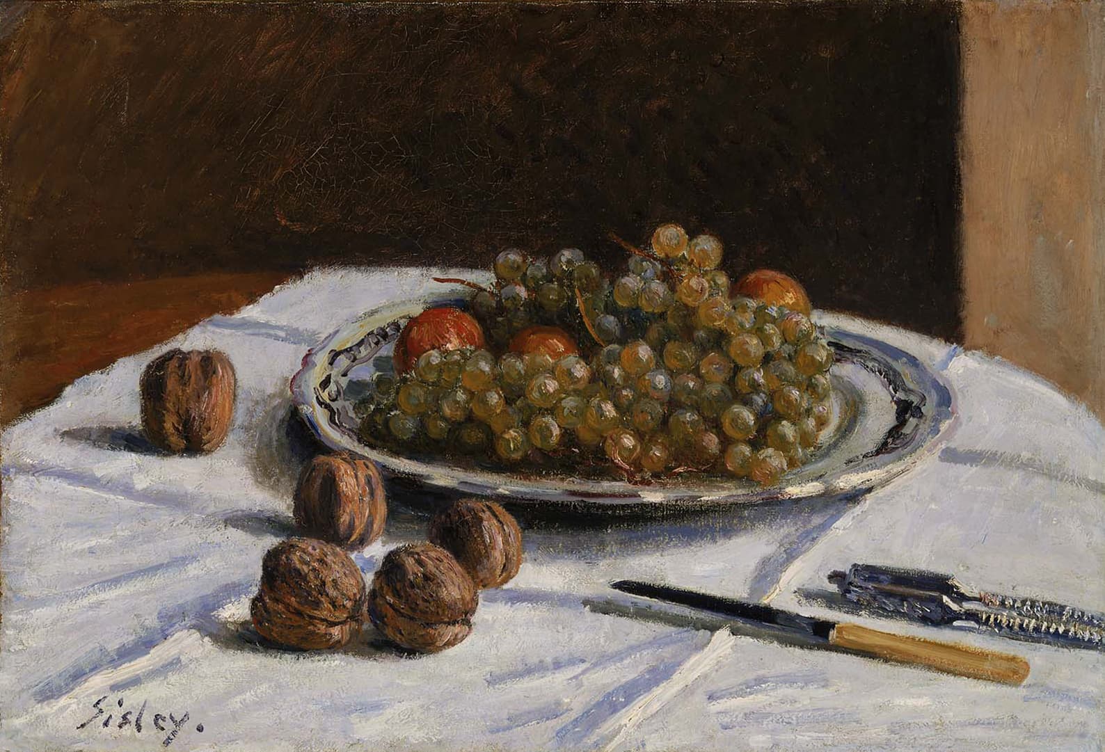 Grapes and Walnuts on a Table
