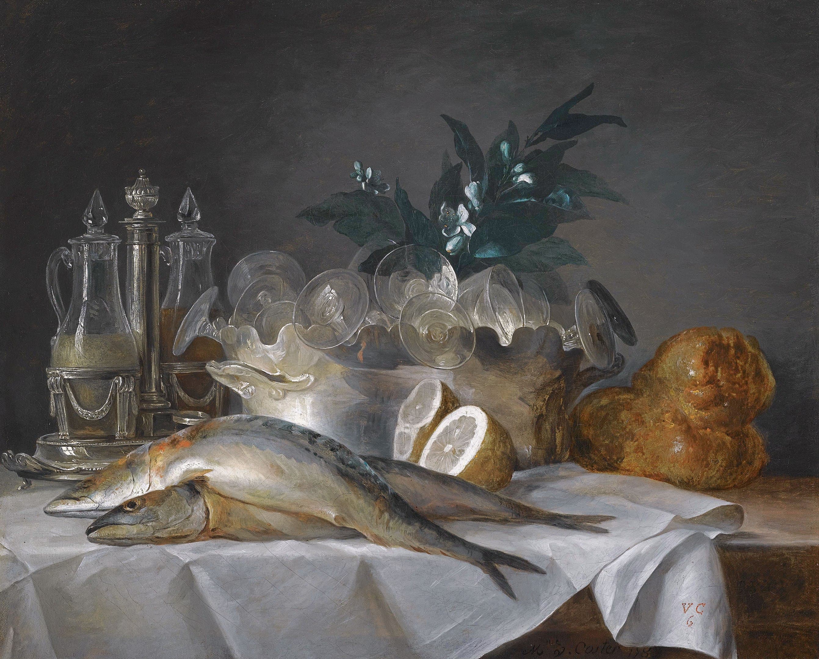 A still life of mackerel, glassware, a loaf of bread and lemons