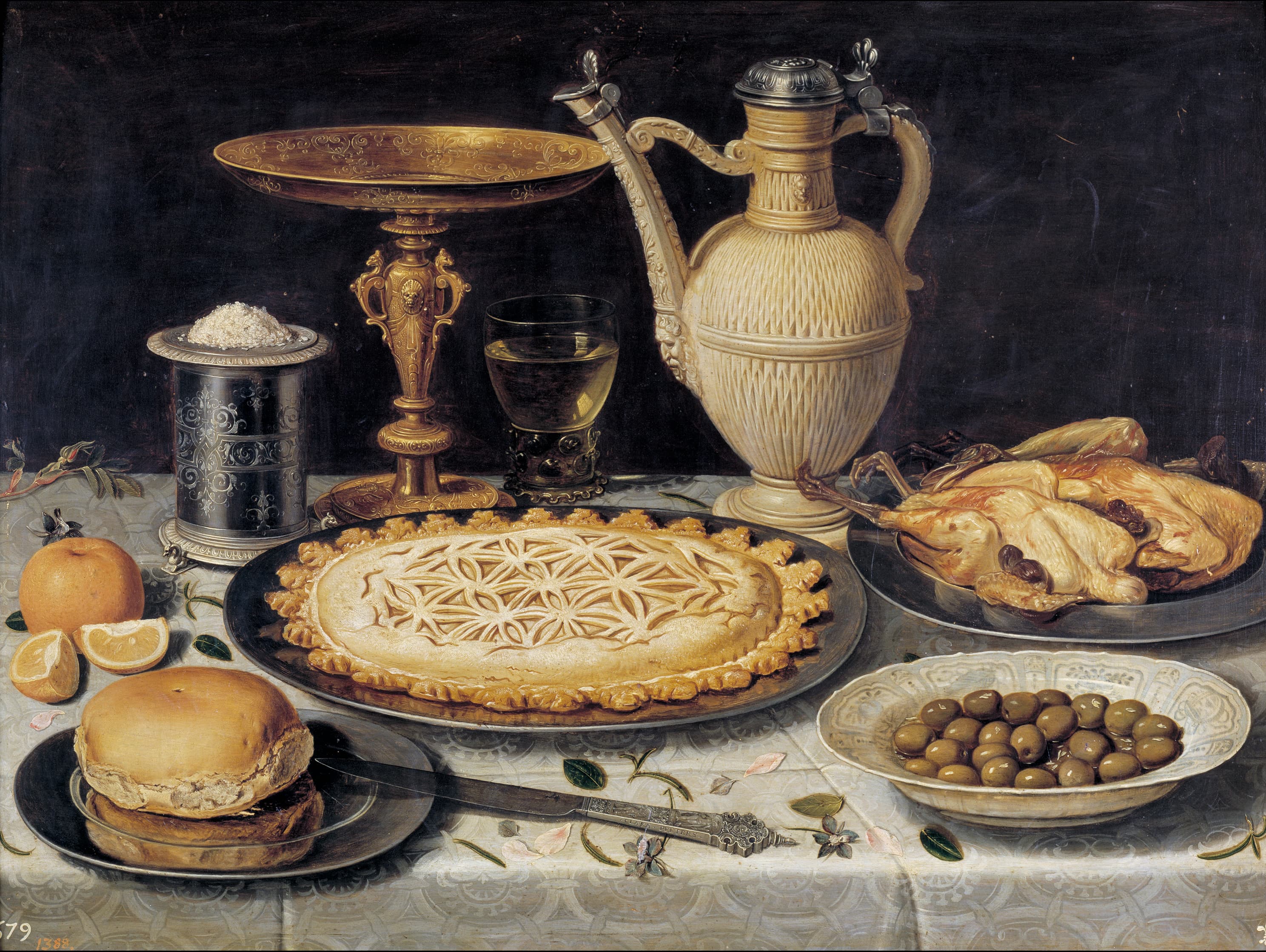 Table with Orange, Olives and Pie