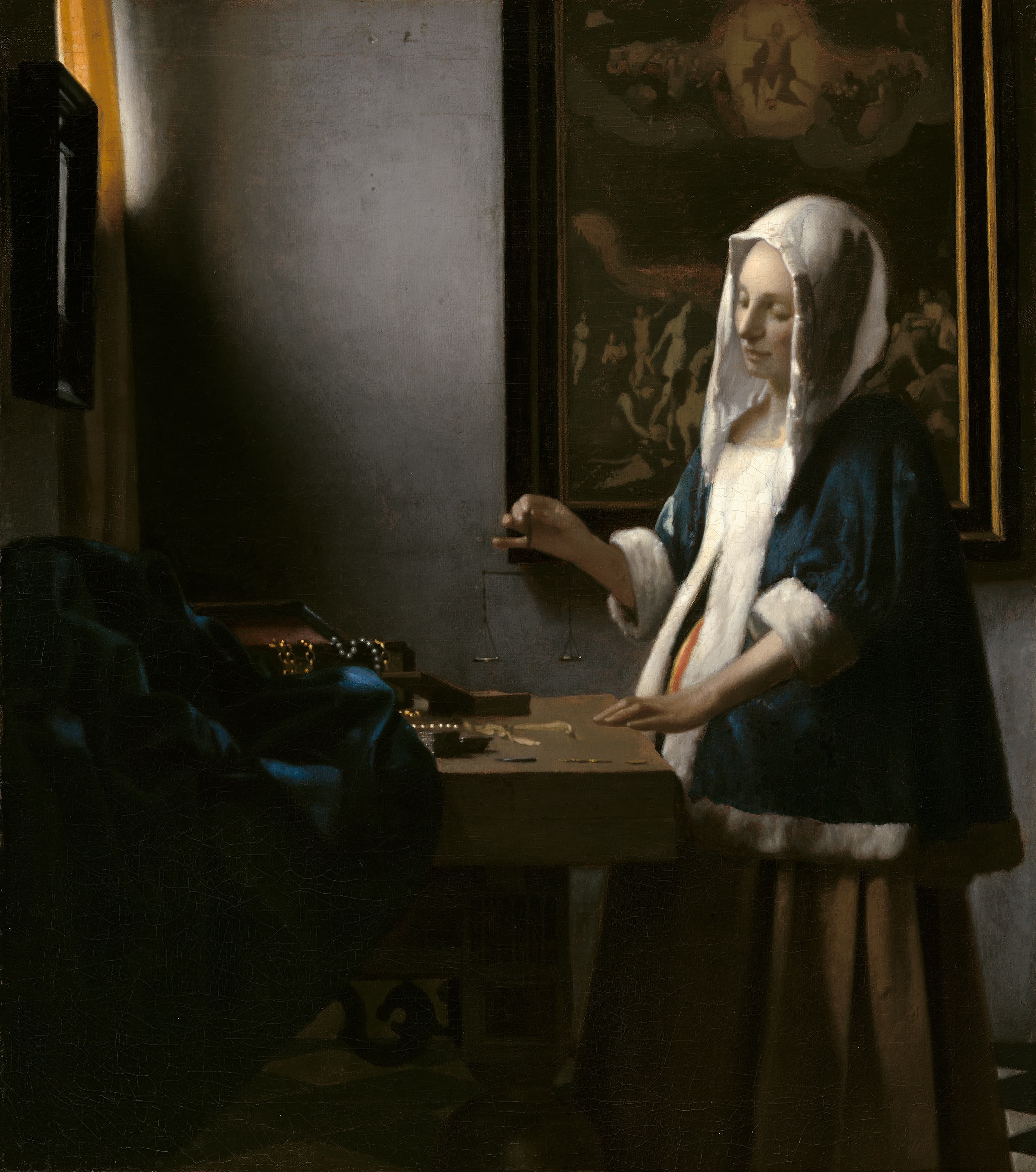 Woman Holding a Balance