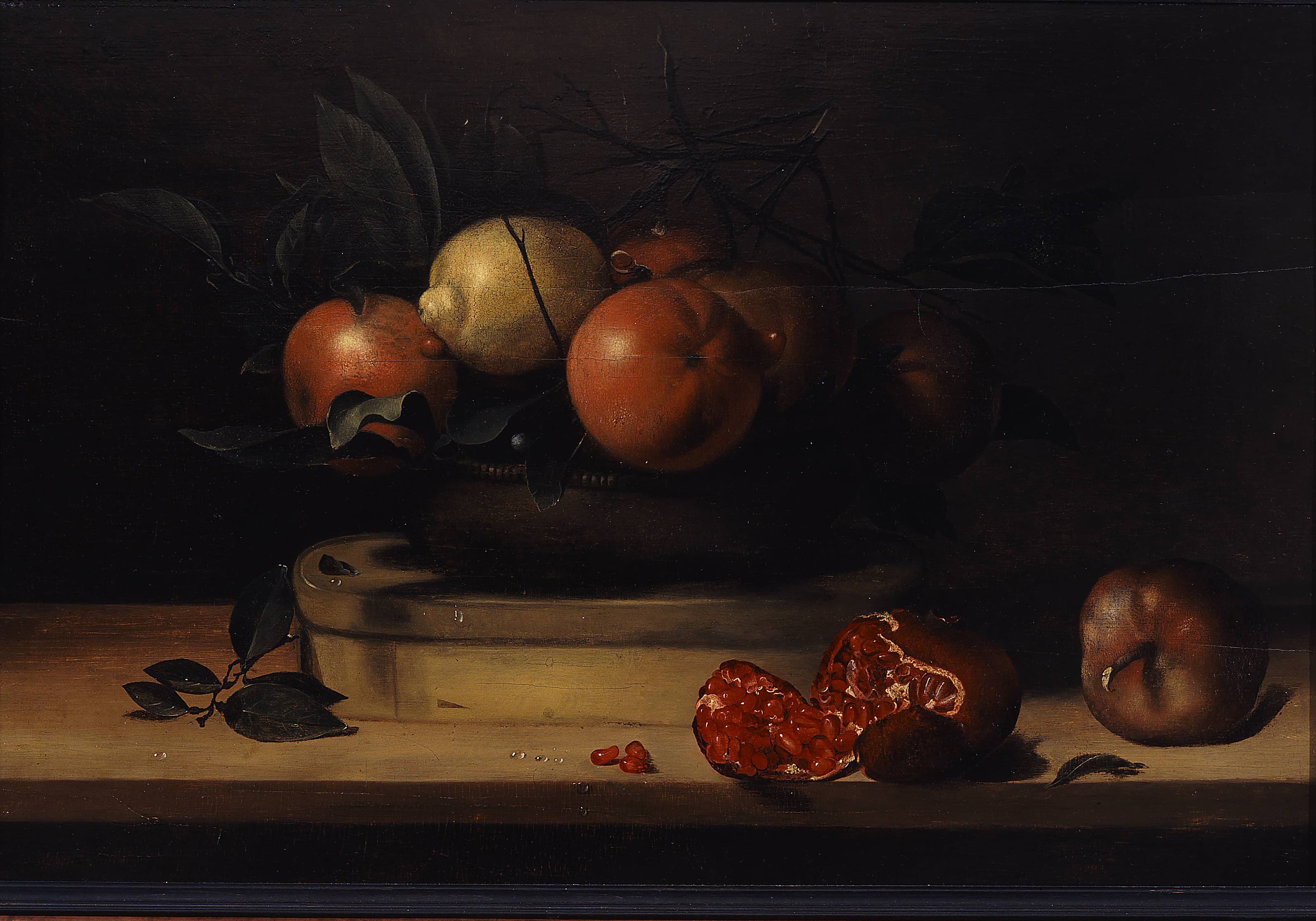 Bowl of Lemons and Oranges on a Box of Wood Shavings and
Pomegranates