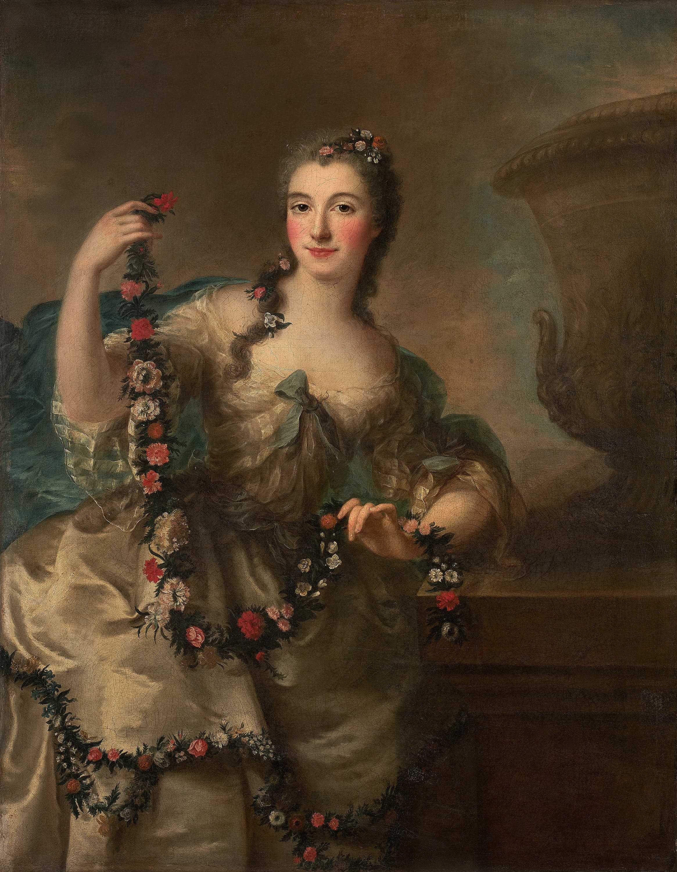 Young lady with a garland of flowers
