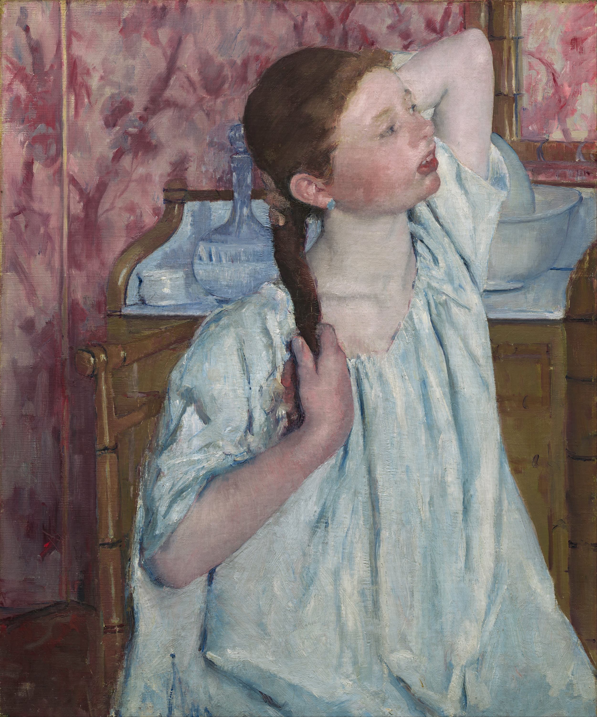 Girl Arranging Her Hair